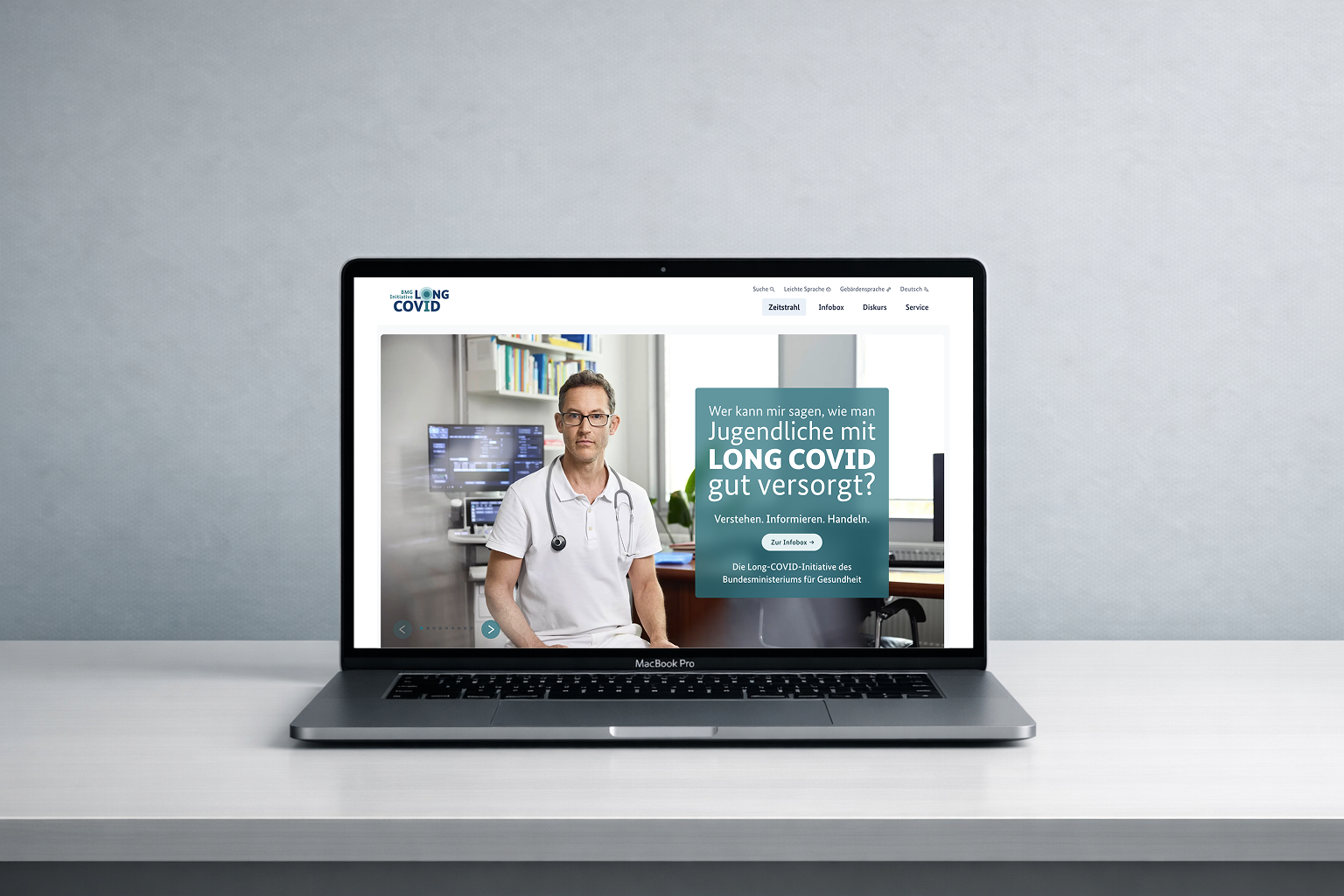 man walking in front of textured wall